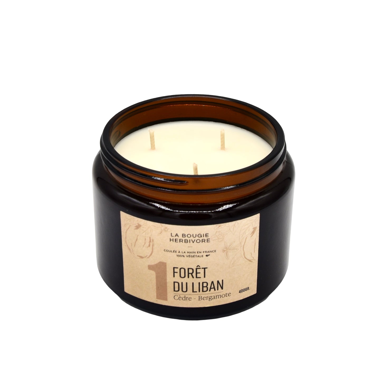 Bougie parfumée cèdre bergamote de La Bougie Herbivore dans un pot en verre ambré