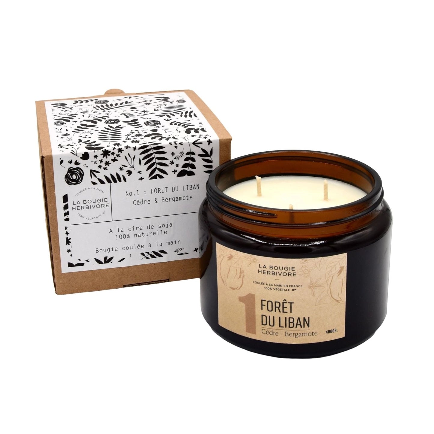 Bougie parfumée cèdre bergamote de La Bougie Herbivore dans un pot en verre avec un emballage naturel
