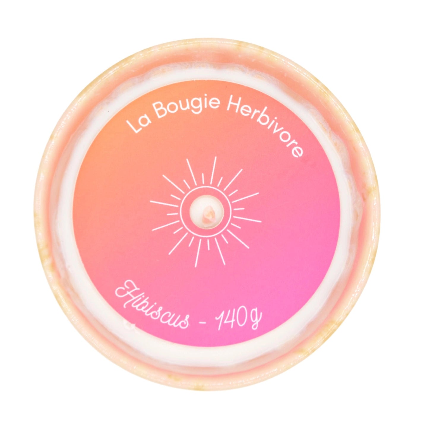 Bougie parfumée hibiscus de La Bougie Herbivore de 140g aux teintes roses et blanches