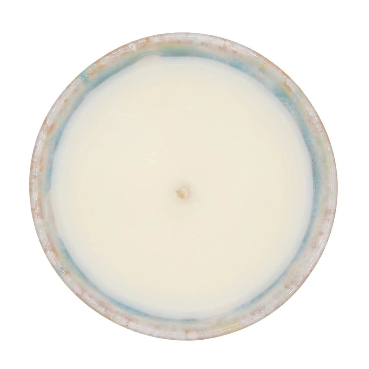 Bougie parfumée thé vert de La Bougie Herbivore dans un pot aux teintes naturelles