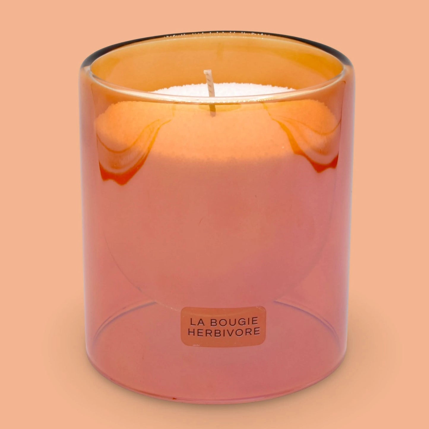 Bougie perlée parfumée made in France dans un contenant en verre rose pétillant